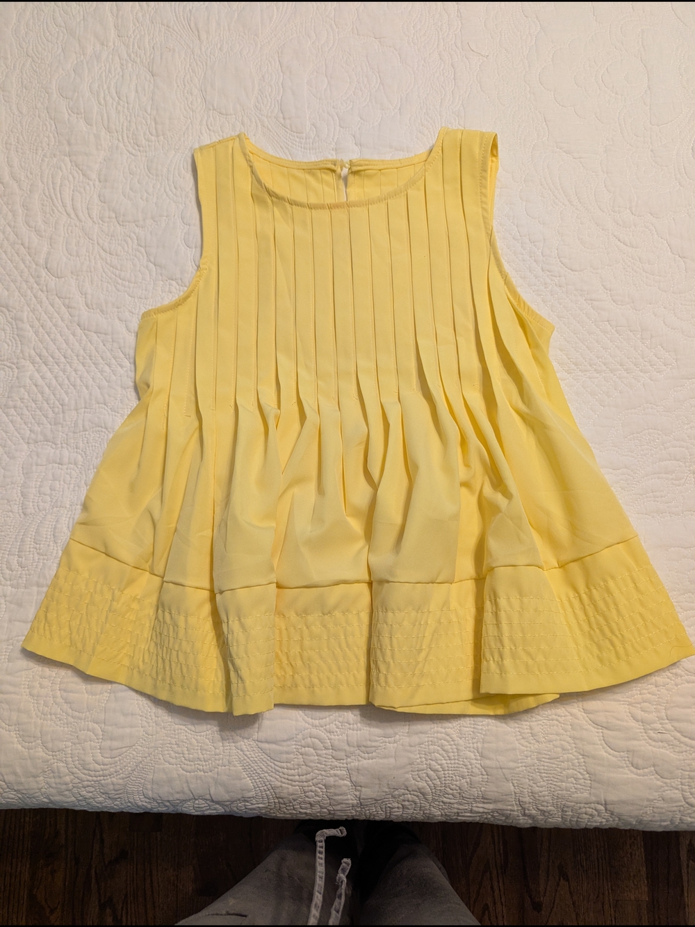 Sleeveless Pleated Yellow Peplum Top